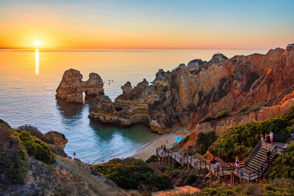 Beautiful sunset over Algarve’s iconic cliffs and coastline