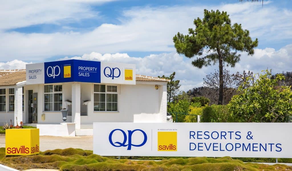 “QP Savills Algarve property sales office exterior with branding and signage