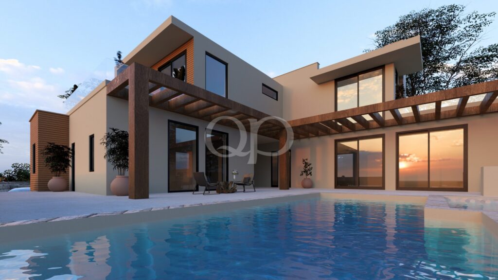 Maison moderne à deux étages, avec une pergola en bois surplombant la terrasse de la piscine au coucher du soleil ; les baies vitrées reflètent la lumière chaude.