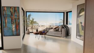 Sala de estar luminosa e moderna, com vista panorâmica para a praia através de uma grande parede de vidro; sofá bege com manta xadrez, uma mesa de centro redonda de madeira e plantas verdes nas proximidades.