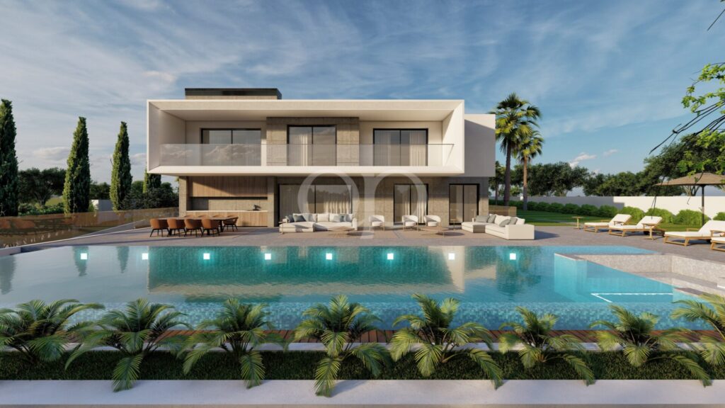 Striking contemporary villa overlooking an expansive pool and elegant landscaped gardens