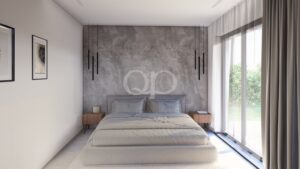 Quarto sereno com uma parede de destaque, iluminação elegante e tons neutros tranquilizantes