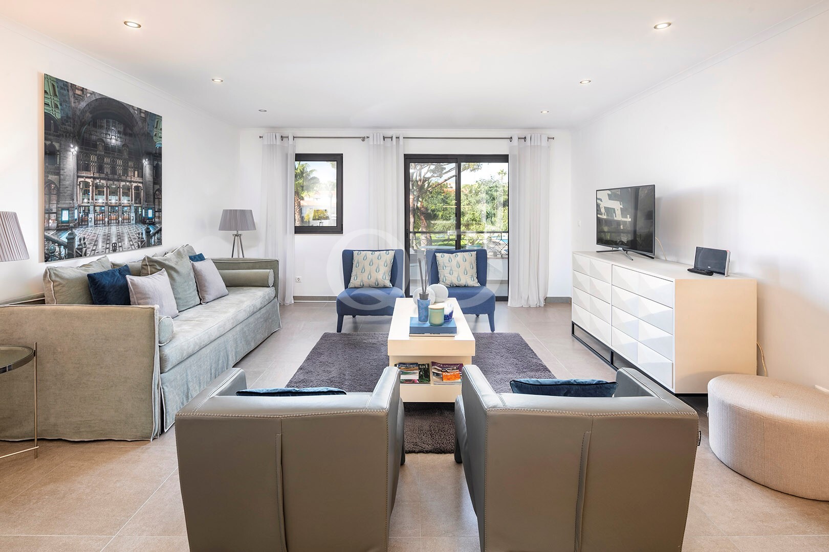 Bright living room with balcony access