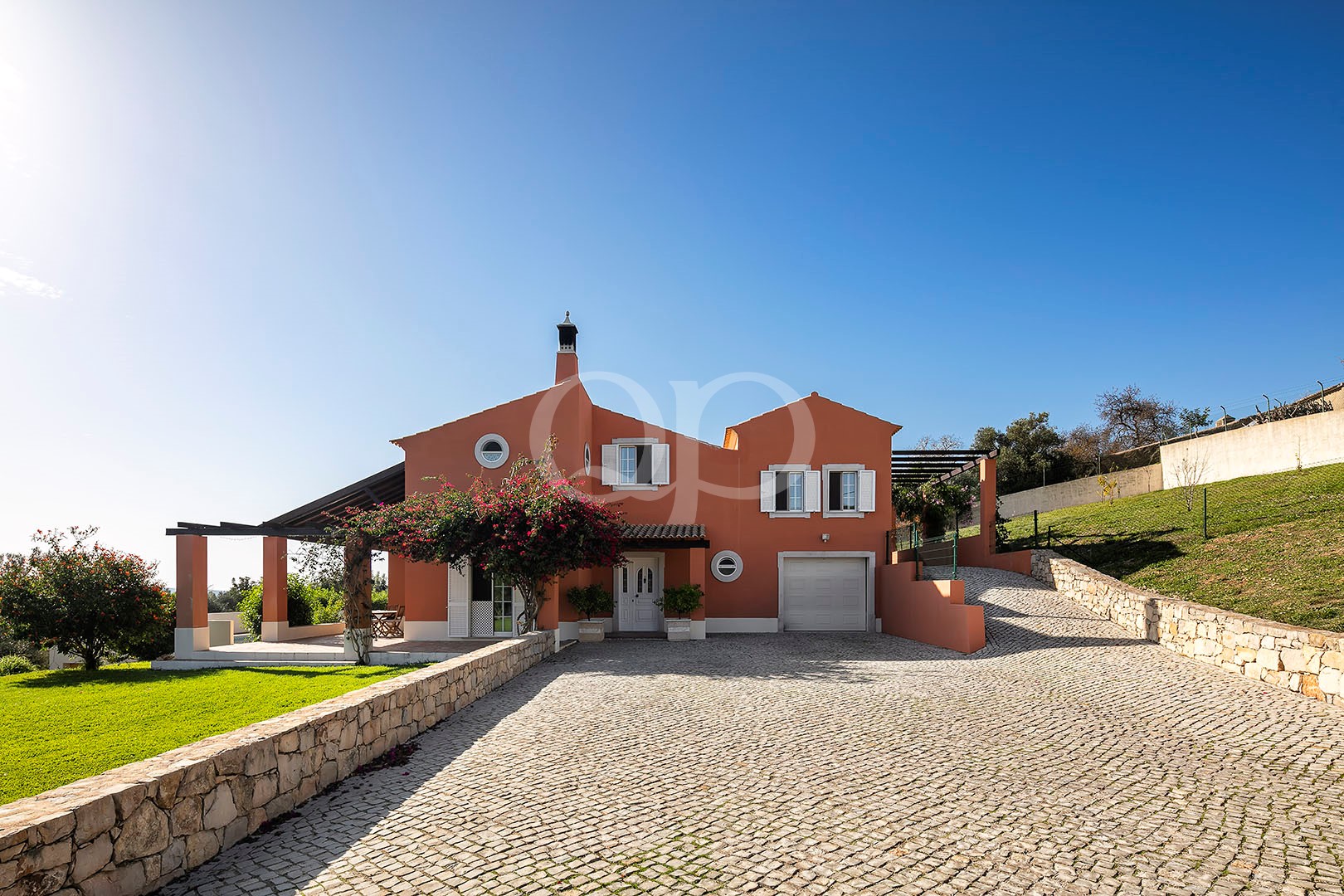 Traditional villa with private driveway and covered entrance