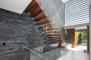 Floating staircase with glass balustrade