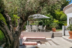 Shaded garden dining terrace