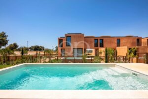 Private swimming pool overlooking contemporary villas