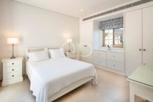 Bright bedroom with fitted wardrobes
