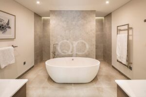 Spacious bathroom with freestanding bath