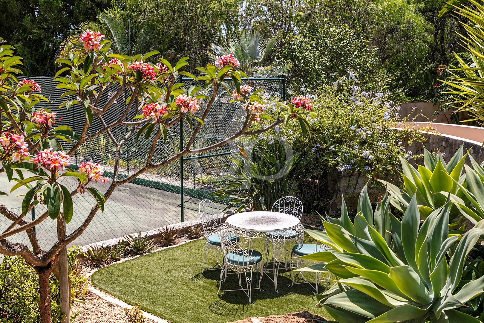 Private Garden Terrace Overlooking Tennis Court