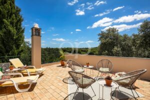Roof terrace with outdoor seating and countryside views