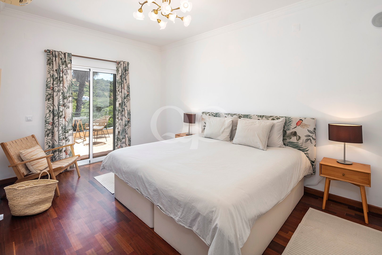 Bedroom with terrace access and garden views