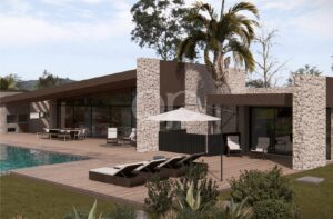 Projeto de uma moradia com fachada em pedra, terraço com piscina e área de lazer ao ar livre