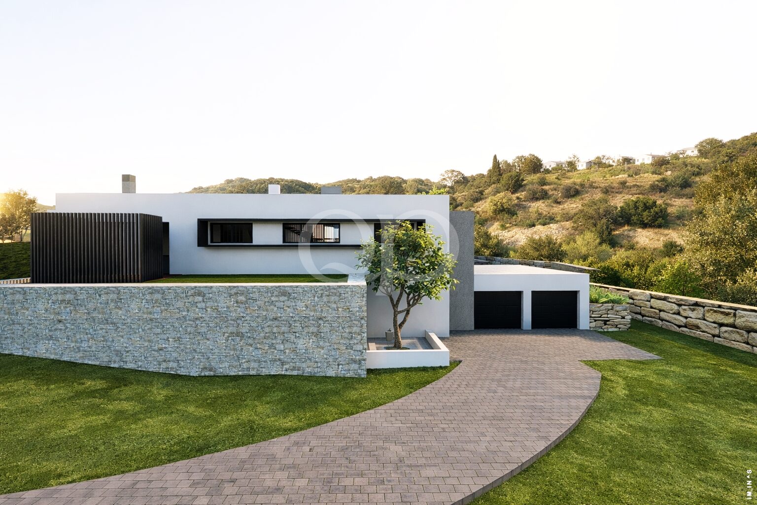 Entrée de villa aménagée avec allée et double garage