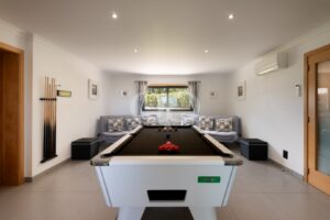 Games room with pool table and built in seating