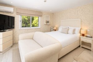 Bedroom overlooking landscaped gardens