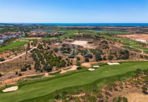 Aerial view across golf course towards the Algarve coast