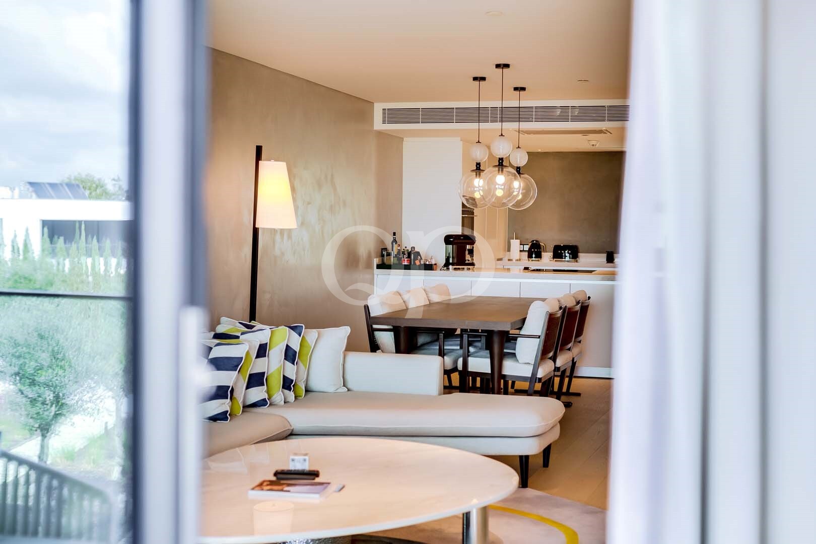 Open plan living and dining space with contemporary interior finishes