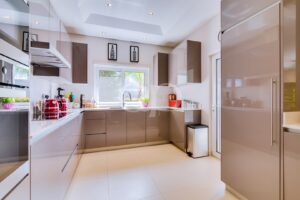 Sleek, modern, and spacious kitchen with marble countertops