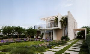 Außenansicht einer modernen Villa mit gepflegtem Garten und Pergola