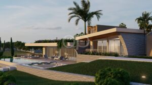 Une terrasse raffinée au bord de la piscine, agrémentée de palmiers et dotée d'une architecture remarquable