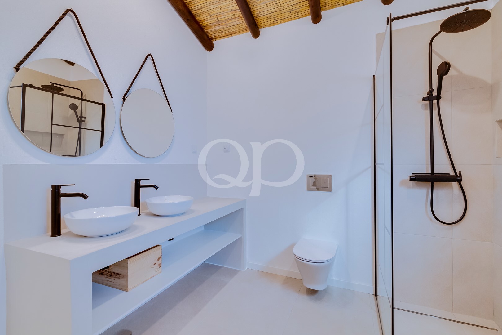 Contemporary bathroom with walk in shower, modern vanity and black fittings