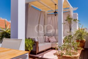 Private rooftop seating offering serene city escape