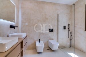 Bathroom with walk in shower, wall mounted sanitaryware and neutral finishes