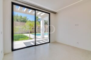 Bedroom with sliding doors and direct garden access