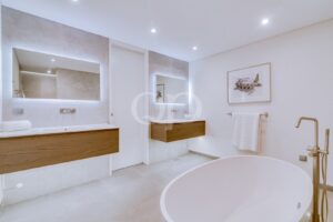 Bright bathroom with double sink vanity