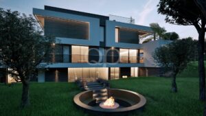 Sleek, grand modern villa featuring a circular sunken firepit and illuminated garden pathway