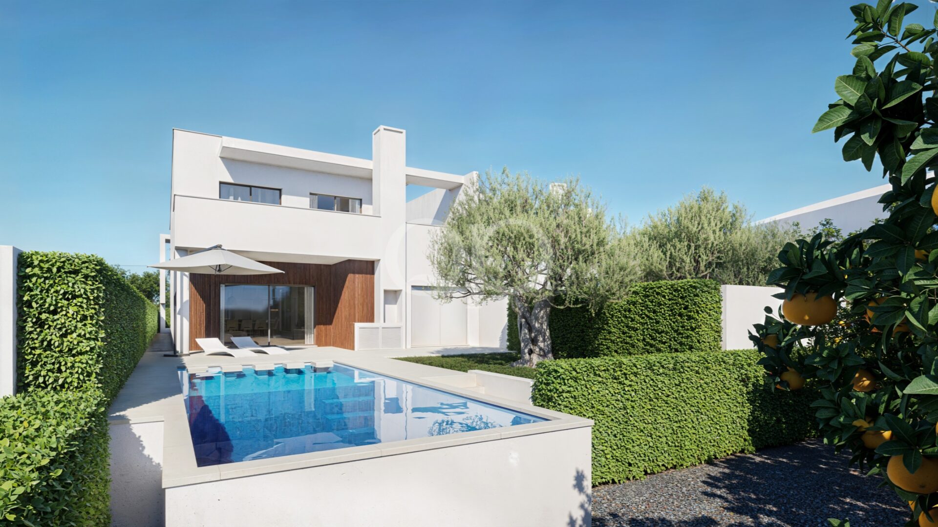Exterior de uma moradia moderna com piscina privada e jardim ajardinado
