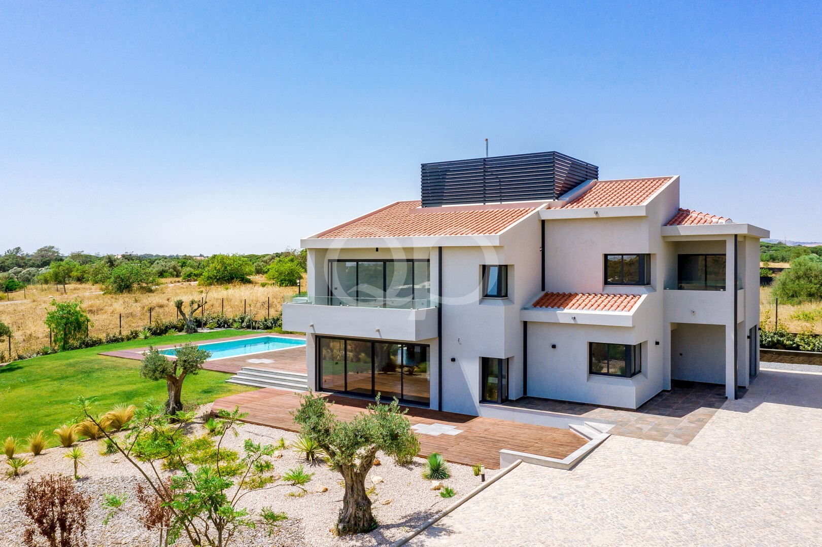 Modern villa with private swimming pool, landscaped garden and spacious terraces