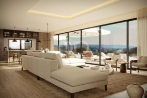 Stunning contemporary open plan living room, dining area, and kitchen with panoramic country views
