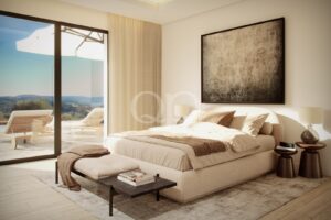 Serene, inviting en suite bedroom with expansive countryside views