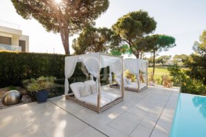 Relaxing Outdoor Daybeds Surrounded by Greenery