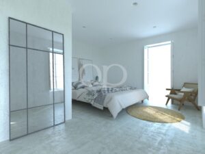 Quarto com divisória de vidro e luz natural