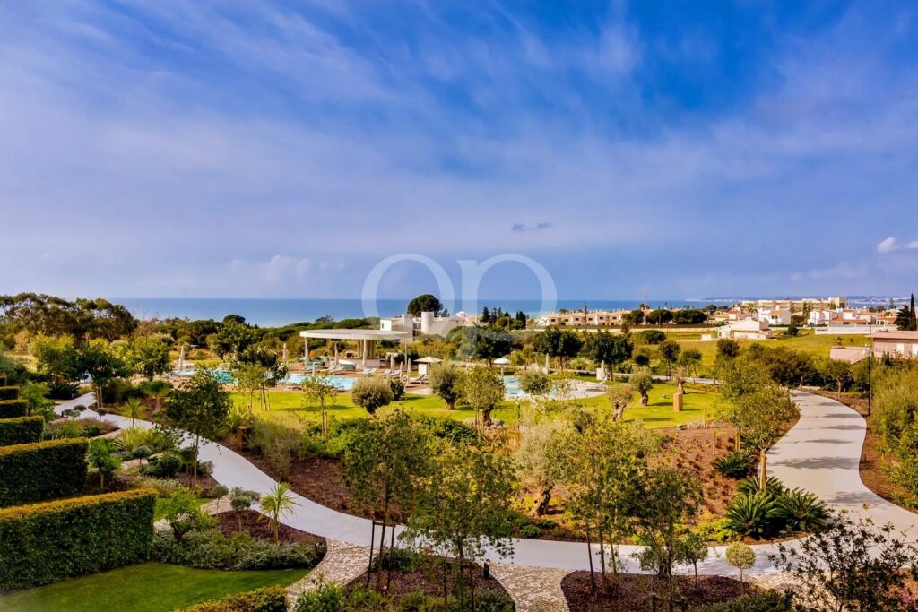 Elevated views across landscaped gardens towards the Atlantic Ocean