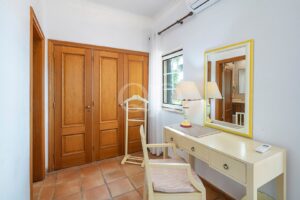 Bedroom with fitted wardrobes and dressing table