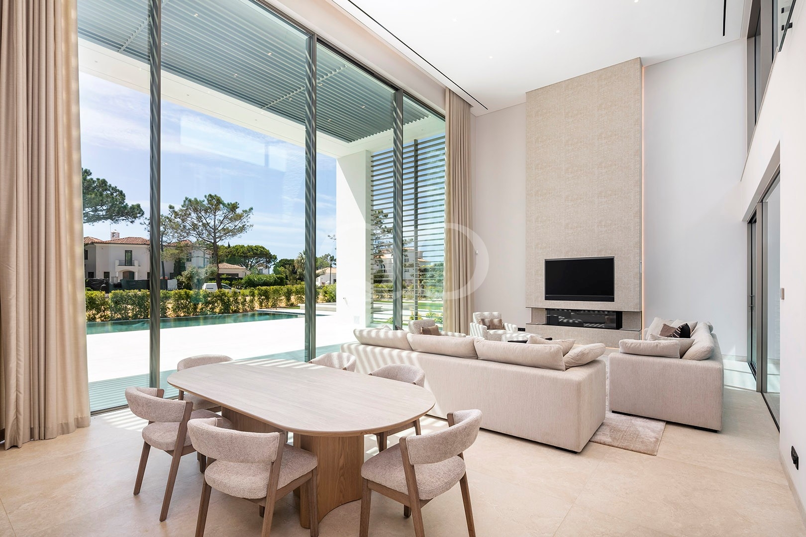 Bright living room with floor-to-ceiling windows