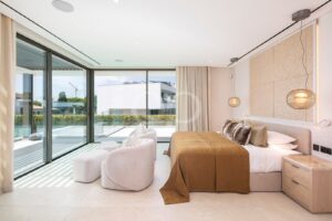Bright bedroom with pool views