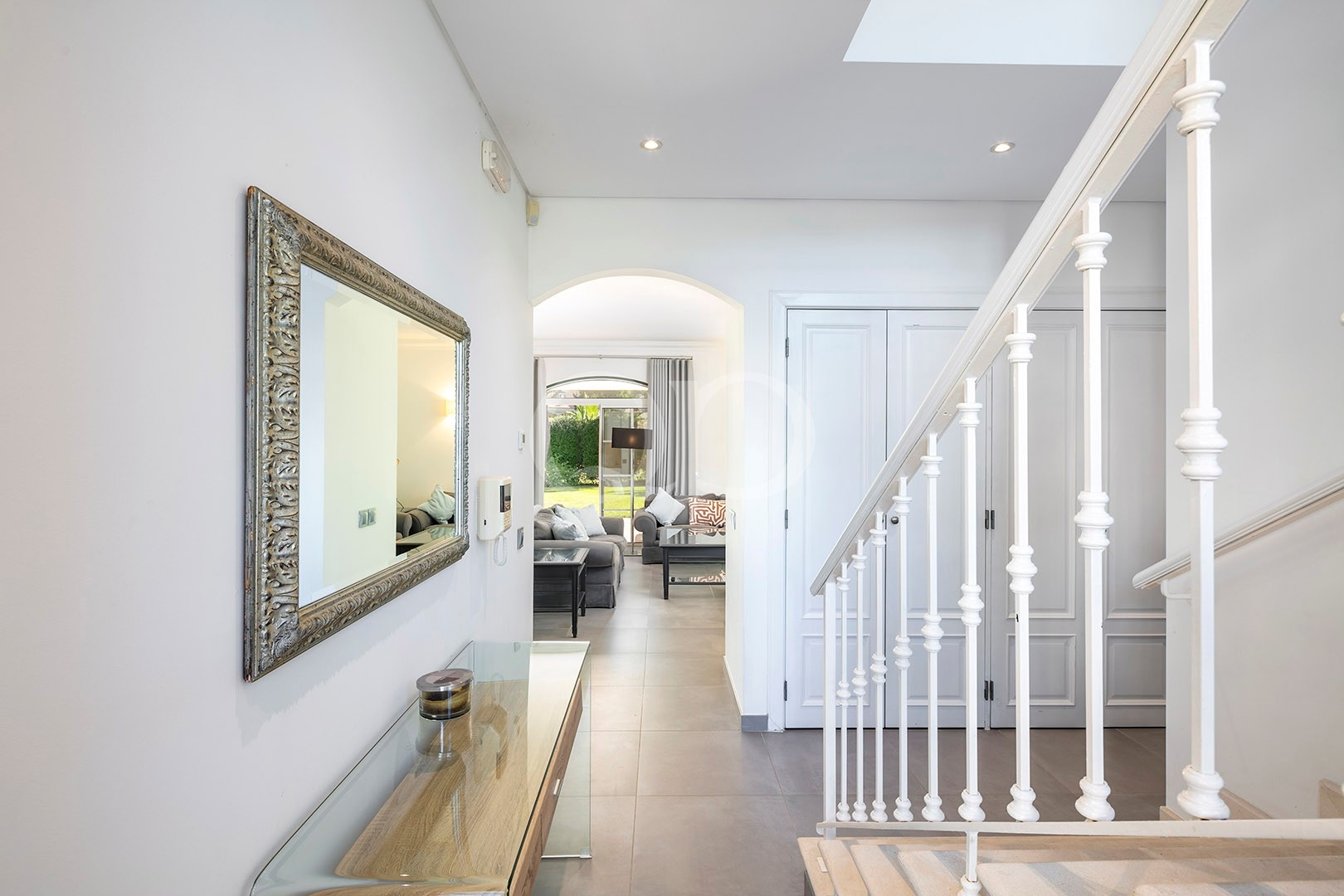 Bright hallway with modern staircase