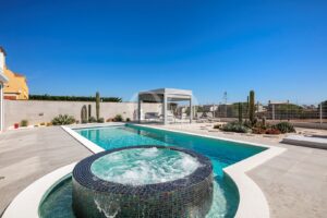 Contemporary Golf-Front Villa with Ocean Views in Lagos - QP Savills