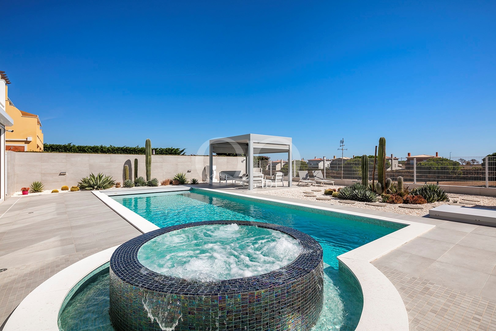 Contemporary Golf-Front Villa with Ocean Views in Lagos - QP Savills