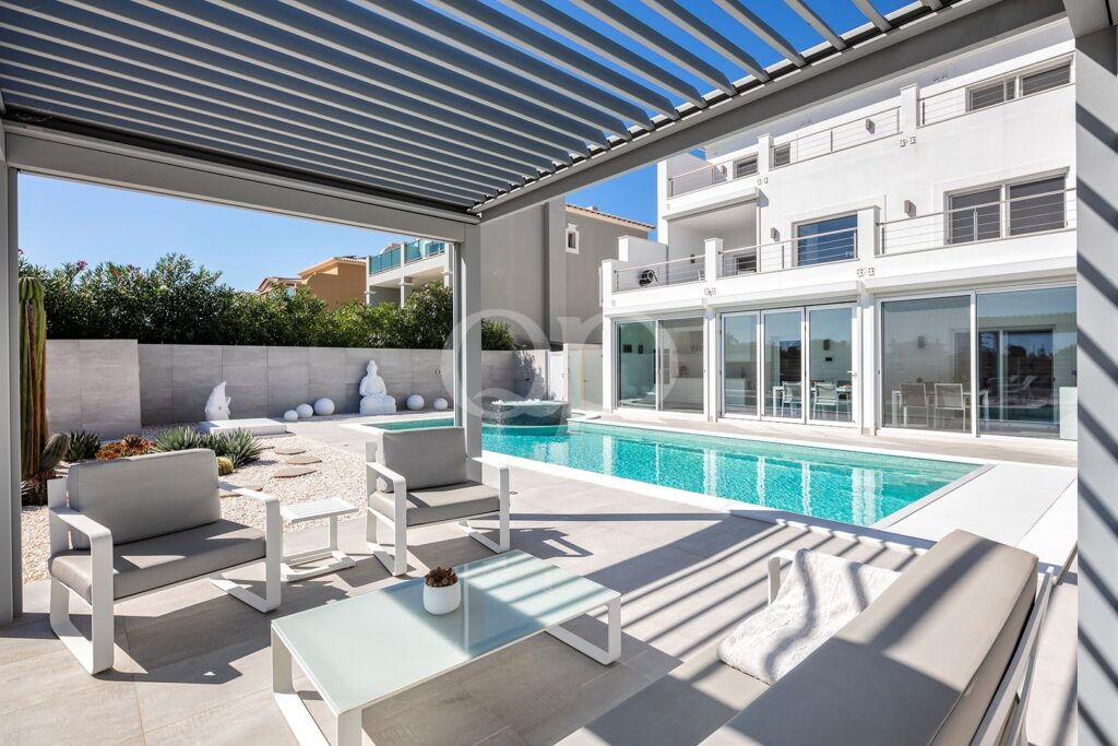 Contemporary Golf-Front Villa with Ocean Views in Lagos - QP Savills