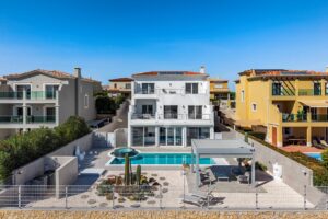 Contemporary Golf-Front Villa with Ocean Views in Lagos - QP Savills