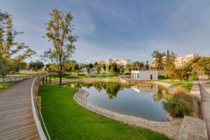 Landscaped gardens and lake at Jardim das Comunidades, Almancil