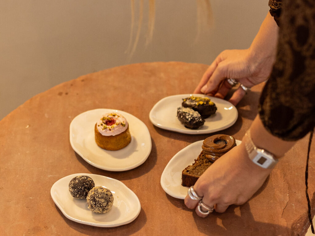 Milla serving Milla Real Food sweet treats at Milla Café in Almancil.